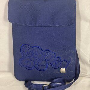 Haiku cross body tablet bag with distinct cloud pattern